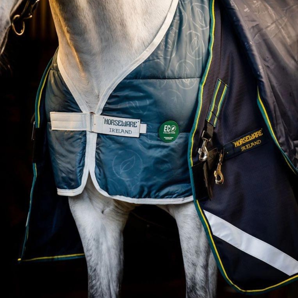 White horse wearing a Horseware Rambo Rug Bundle