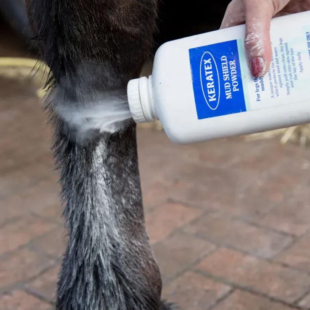 Keratex Mud Powder being applied to horse leg
