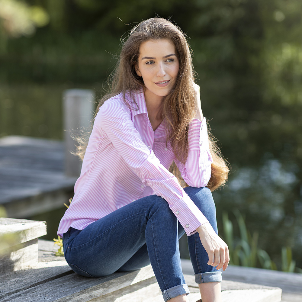 Woman wearing Rydale striped ladies country shirt in pink