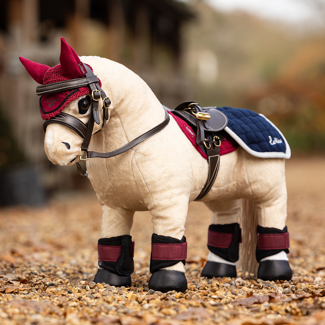 Toy Pony Popcorn wearing LeMieux Ember Accessories and brown toy tack