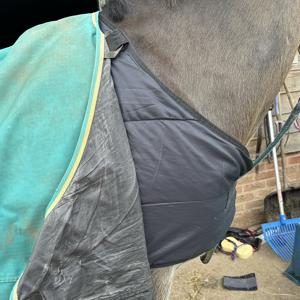 Shires Warmarug rug liner attached beneath a turnout rug